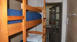 Гостиница Ethnomir Hostel Kruiz Петрово Односпальная кровать в общем номере для мужчин и женщин-6